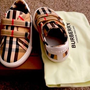 I am selling a pair of Burberry toddler shoes.